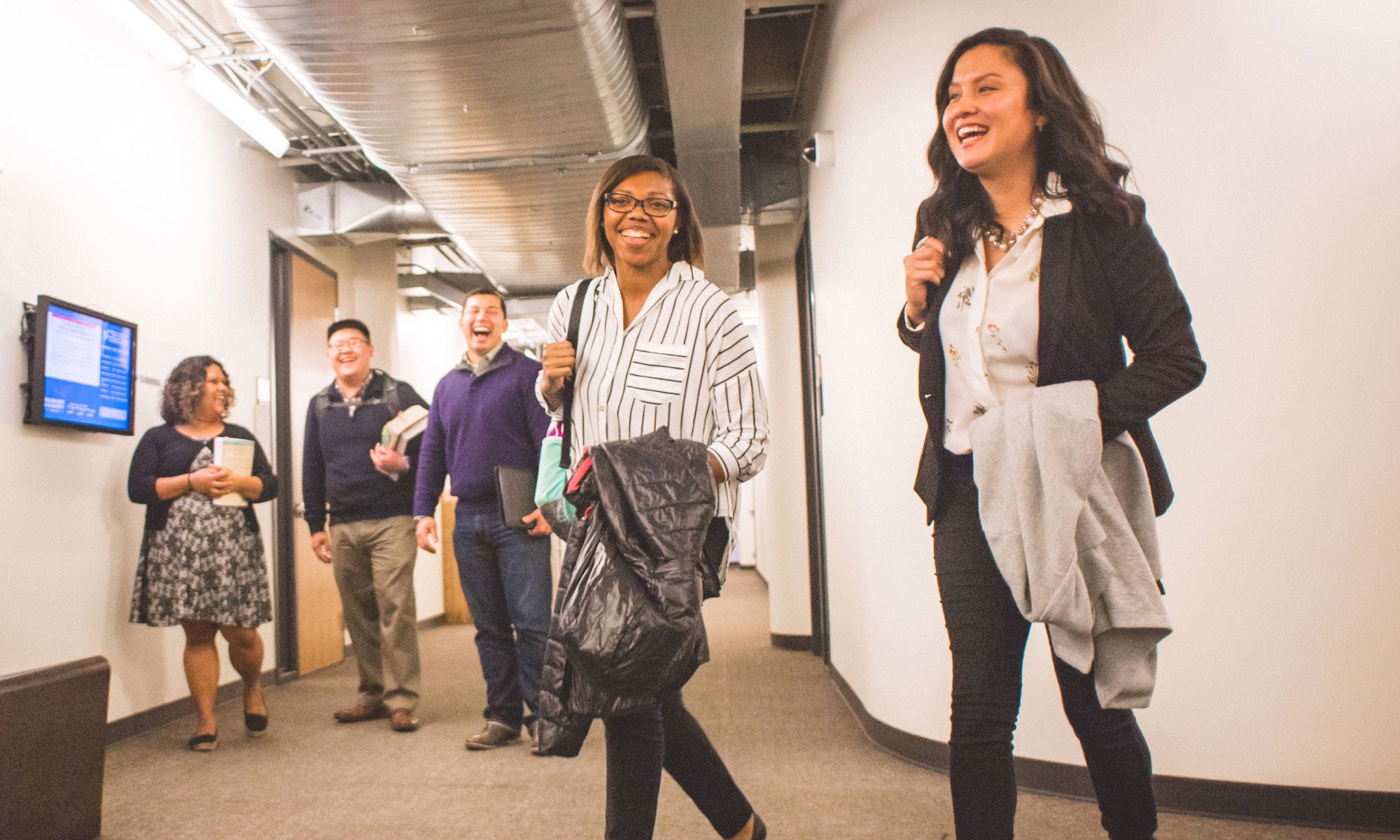 Students with backpacks walking to class.